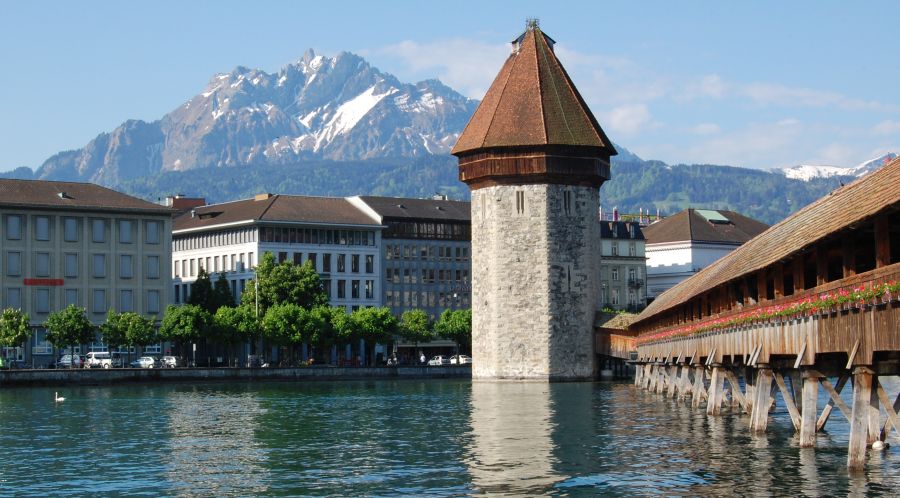 The Kapellbrücke ( Chapel Bridge ) across the River Reuss in Lucerne in central Switzerland